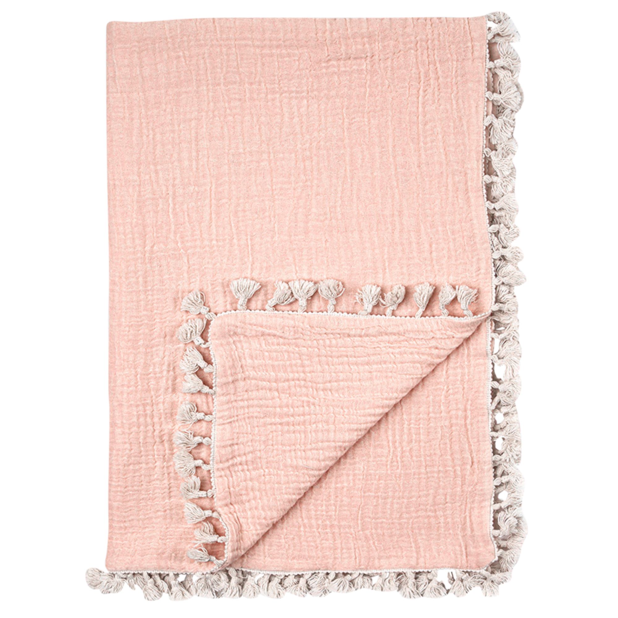 Pink muslin blanket on white background