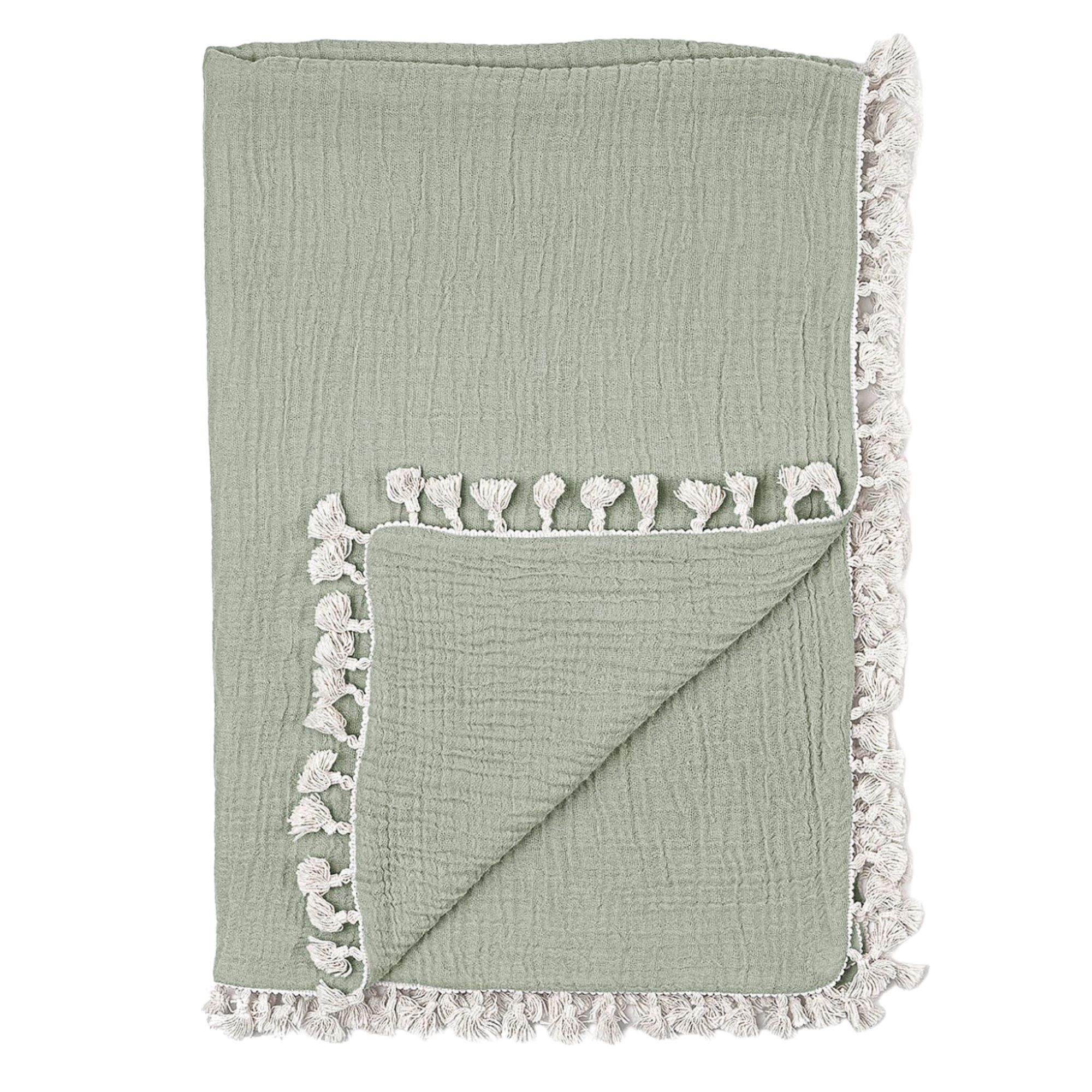Green muslin blanket on white background