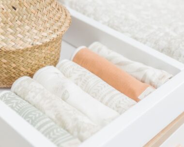 row of burp cloths in a drawer