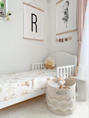 Toddler bed in the corner of a room