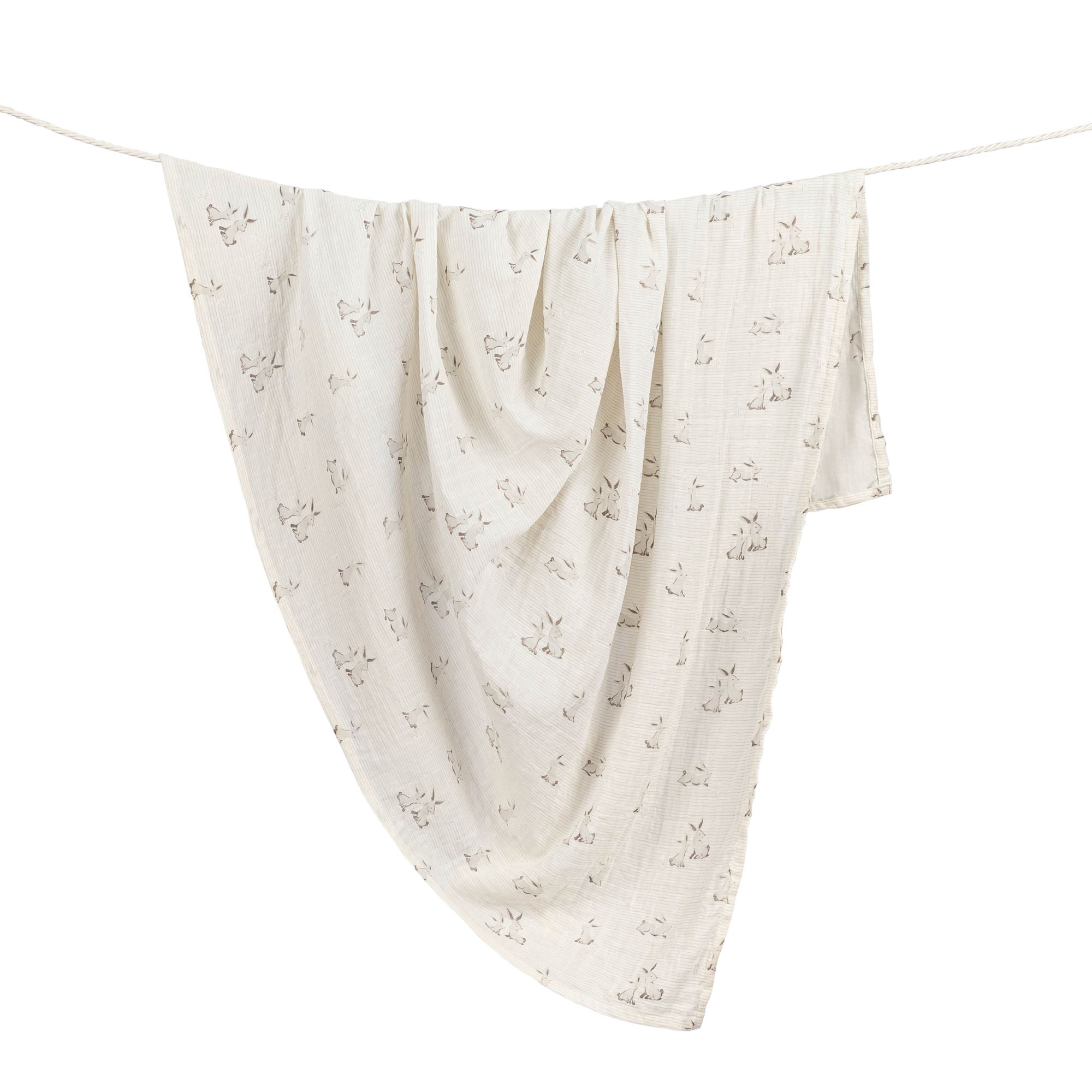 Baby swaddle hanging on a clothesline