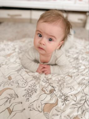 Baby doing tummy time on a mat