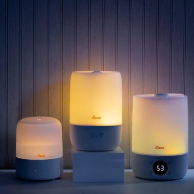 3 humidifiers with night lights on a table