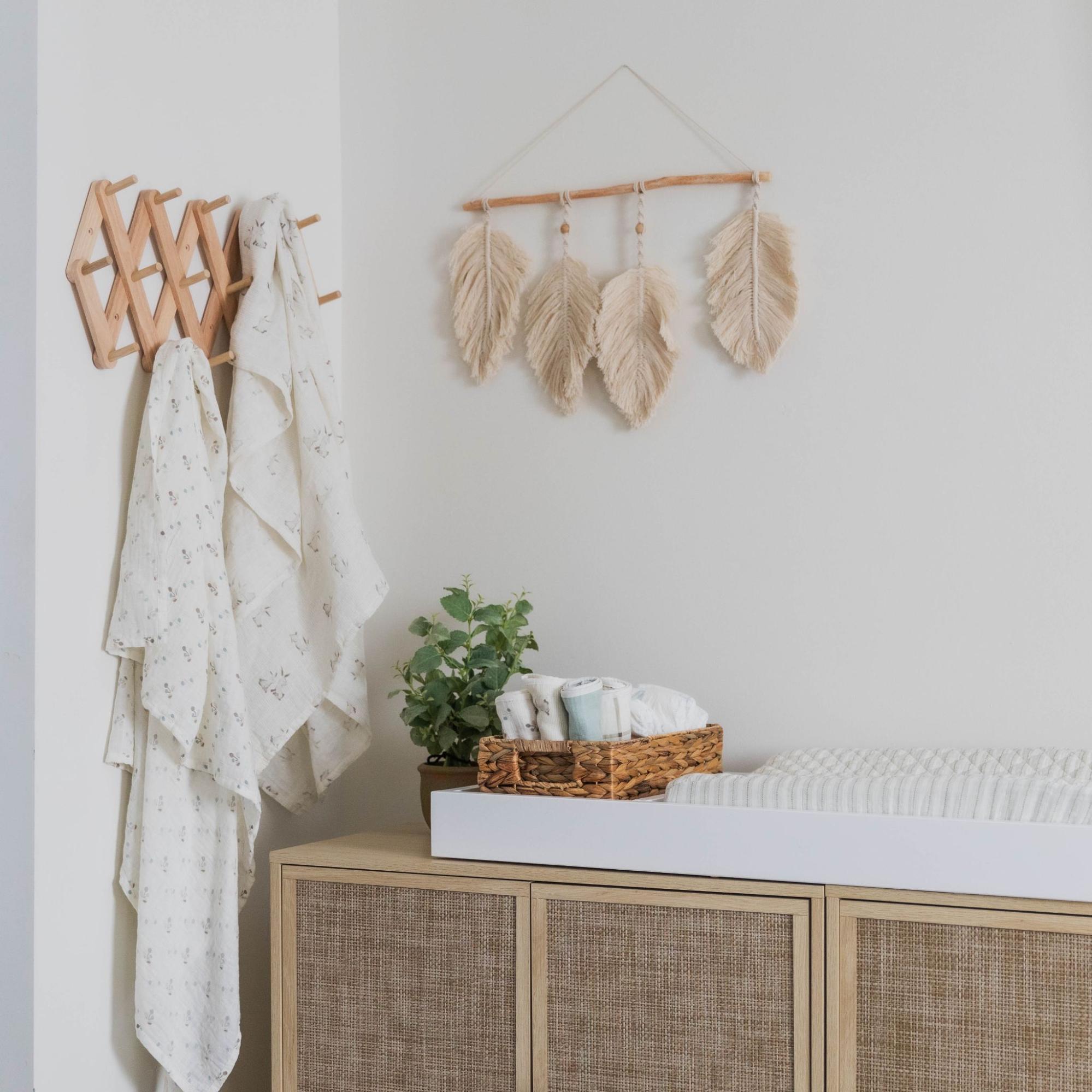 Baby changing table in the corner of a nursery