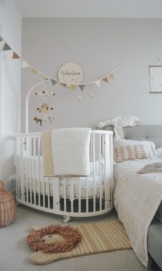 Crib in the corner of a bedroom