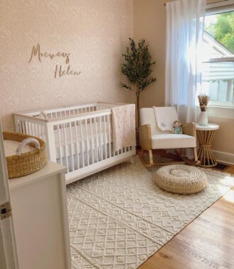 Small nursery with a crib, rocking chair and diaper changing table