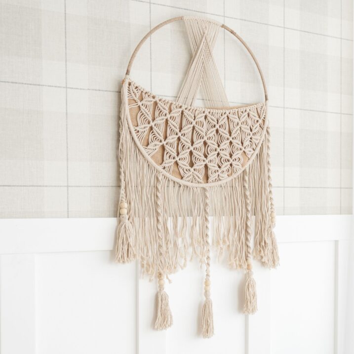 Macrame boho toy storage basket on the wall